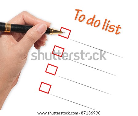 female hand checking to do list