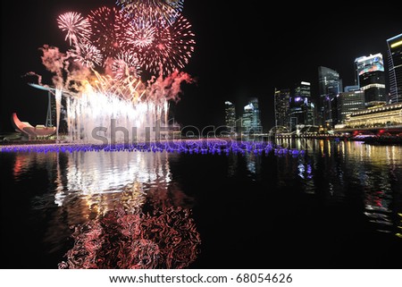 SINGAPORE - DECEMBER 31:  Marina Bay Singapore Countdown 2010/2011, Singapore Marina Bay Fireworks DECEMBER 31, 2010 in Singapore.
