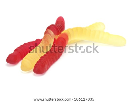 Jelly worms or snakes candies on a white background