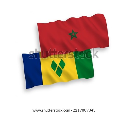 National vector fabric wave flags of Saint Vincent and the Grenadines and Morocco isolated on white background. 1 to 2 proportion.