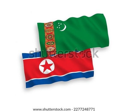 National vector fabric wave flags of North Korea and Turkmenistan isolated on white background. 1 to 2 proportion.