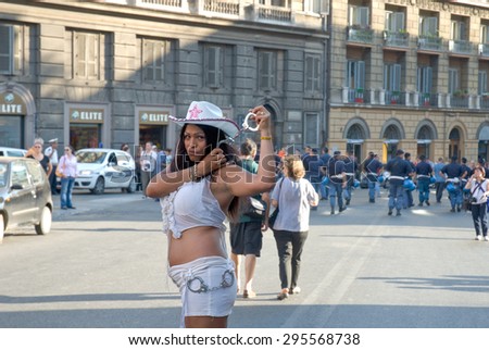ROME, ITALY - JUNE 24 2006. Gay pride day, parade people on city streets during the demonstration. Transgender posing