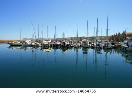 Small sailboats in a Chania harbor (Crete)