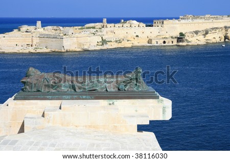 War Siege Memorial and view of Grand Harbour as a background  (Valletta, Malta, Maltese islands)