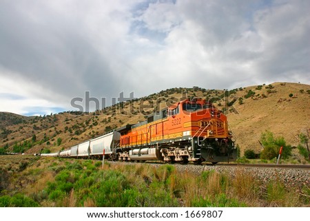 A freight train crossing the northern part of Colorado in late afternoon.