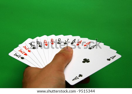 the best bridge cards (A,K,Q,J spades, A,K,Q hearts, A,K,Q diamonds, A,K,Q clubs)  background green,