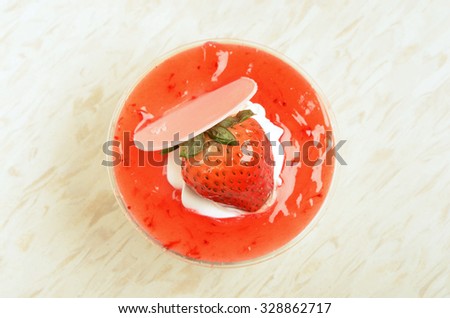 Strawberry mousse cake in glass cup.