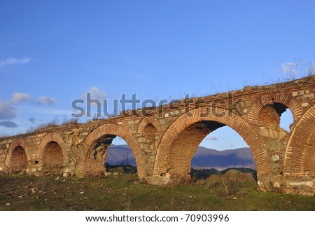 The remains of an old roman aqueduct near city of Skopje Zdjęcia stock © 