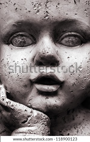 Angel Face - Closeup of a sculpted cherub face