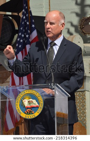 HOLLYWOOD, CA - SEPTEMBER 18, 2014: Governor Jerry Brown at podium speaks about California jobs at the signing of the California Film and TV Job Retention Act in Hollywood on September 18, 2014.