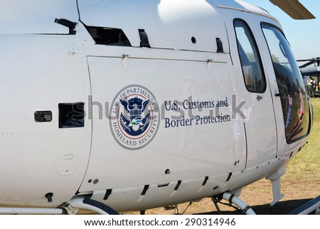 LAKE VIEW TERRACE, CA â?? JUNE 20, 2015:  A U.S. Customs and Border Protection helicopter is parked on display at the American Heroes public air show on June 20, 2015 in Lake View Terrace, California.