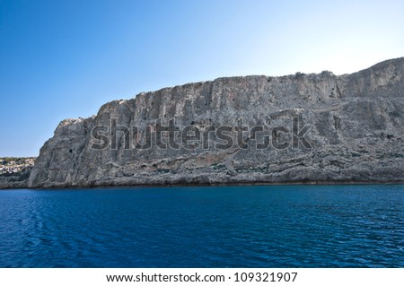 the cliffs at navarone bay on the greek island of rhodes. This is the site of the iconic war film \