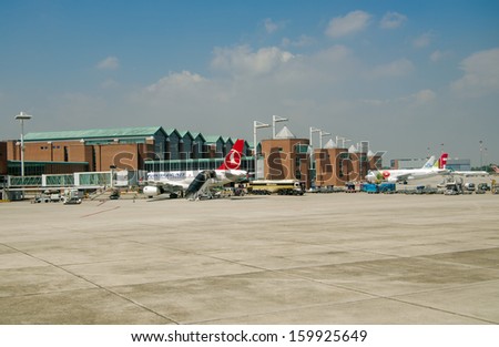 VENICE, ITALY - JUNE 11: Planes parked at the passenger terminal of Marco Polo Airport, Venice on June 11, 2013.  The airport is popular with tourists to the region.