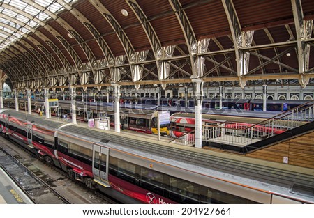LONDON, UK - MAY 15, 2014:  Trains on London\'s Heathrow Express service waiting at platforms at Paddington Station, West London.