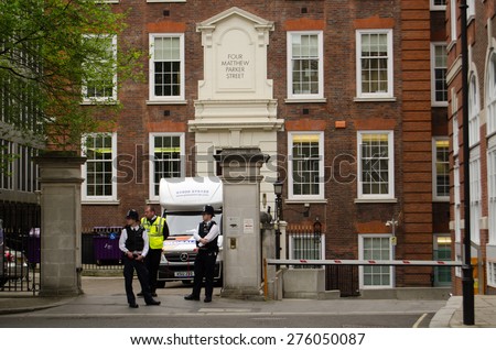 LONDON, UK - MAY 7, 2015:  Police and security staff outside the headquarters of the Conservative Party in Westminster on the day of the General Election in the UK.