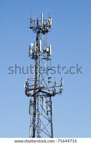 A tower with mobile telephone and other electronic communication transmitters.