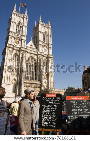 LONDON, ENGLAND, UK - APRIL 27: A bookmaker hopes to take bets from gamblers on the Royal Wedding on April 27, 2011 outside Westminster Abbey, London, UK.