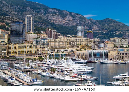 Monte Carlo city panorama. View of luxury yachts and apartments in harbor of Monaco, Cote d\'Azur.