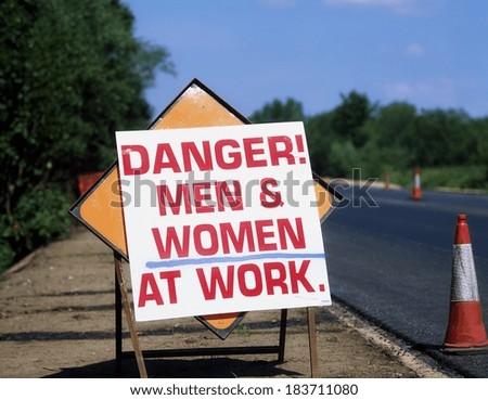 Co Limerick, Ireland; Men And Women At Work Sign