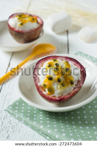 Milk ice cream with Passion fruit topping