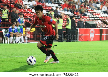 THAILAND- APRIL 12 :J. Pornsai in AFC CUP Group G between Muang Thong utd (Red) & Victory sc (white) on April 12, 2011 at Yamaha Stadium Bkk,Thailand