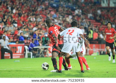 THAILAND- APRIL 12:Unidentified players in AFC CUP Group G between Muang Thong utd (Red) vs Victory sc (white) on April 12, 2011 at Yamaha Stadium Bkk,Thailand