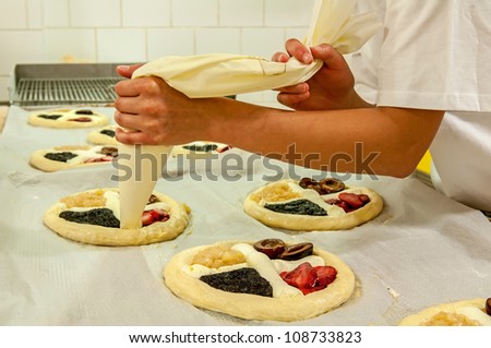 Picture of a production process of Czech traditional pies.