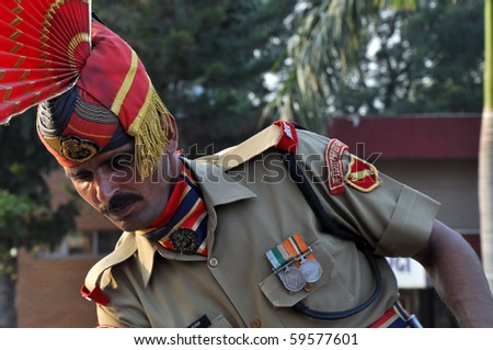 WAGAH BORDER, PUNJAB, INDIA - OCTOBER 25 : Member of indian Border security force guards during the everyday ceremonial on indo-pakistan border on October 25, 200 in Wagah Border, Punjab, India.