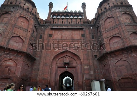 OLD DELHI, INDIA -OCTOBER 24: People enter the Red Fort on October 24, 2009 in Old Delhi, India. The Red Fort, a UNESCO World Heritage, is one of the most popular tourist destinations in Old Delhi.