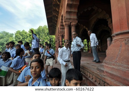 OLD DELHI, INDIA -OCTOBER 24: Pupils enter the Red Fort on October 24, 2009 in Old Delhi, India. The Red Fort, a UNESCO World Heritage, is one of the most popular tourist destinations in Delhi.