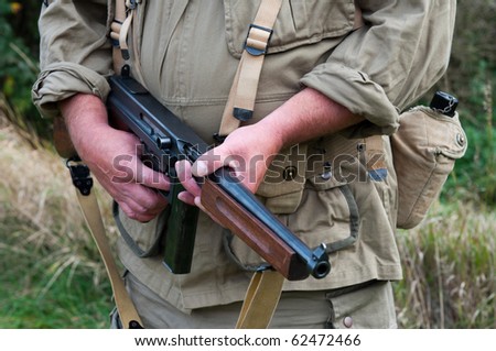 American soldier with submachine gun, second world war style.