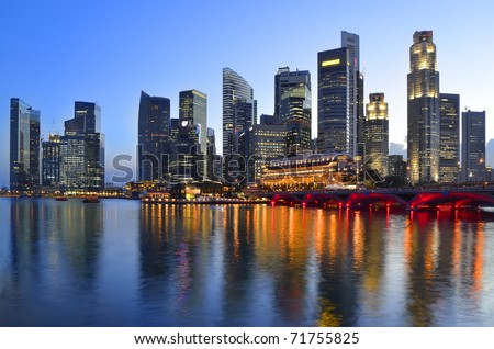 Singapore skyline and river at blue hour