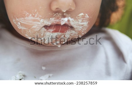 Baby with dirty mouth after eating