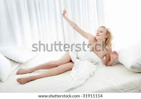 Woman feeling good at the morning in her bedroom
