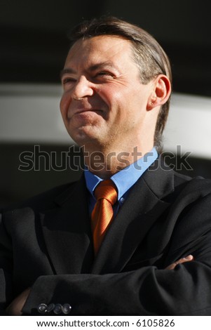 Smart Business Man in Business Suit and smiling