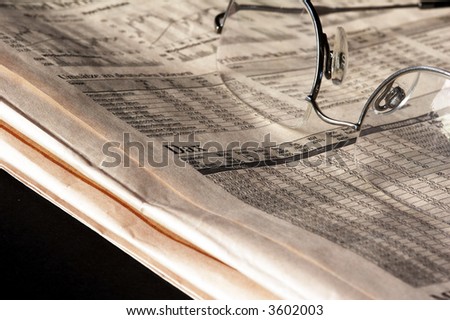 Newspaper with German Stock Market and glasses
