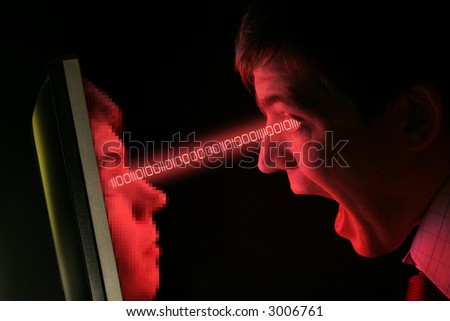 A man in shirt and tie screams at a red computer monitor as his own pixelated face emerges from it (coarse pixels) and transmits binary into his eye