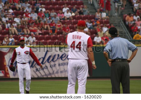 Adam Dunn and Ken Griffey Jr playing catch before a game