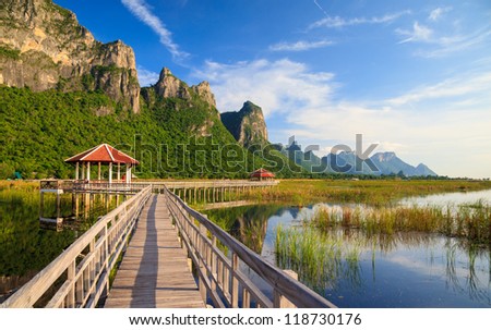 Wooden Bridge in lotus lake at khao sam roi yod national park, thailand