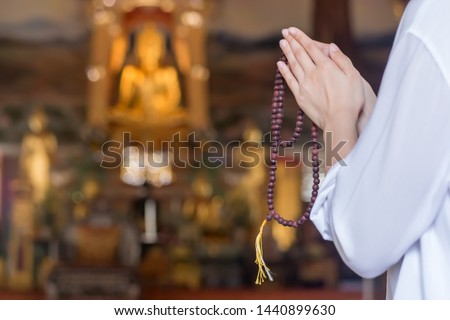 Similar – Image, Stock Photo Buddhist prayer with rosary beads