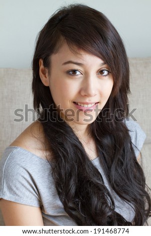 happy and positive woman in casual dress, indoor scene