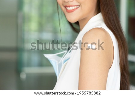 Confident asian woman getting vaccinated immunity via vaccine program, concept of healthy inoculation, vaccination, vaccine for business office worker, vaccinated patient, herd immunity by vaccine