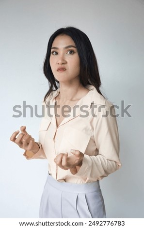 Similar – Image, Stock Photo Young emotional very angry and worried woman screaming. Screaming woman -African descent- covering her ears