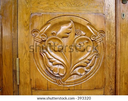 Carved wood. Wooden door, detail