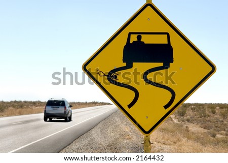 A funny but sick sign along a desert highway.