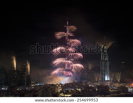 DUBAI, UAE - JANUARY 1: New year celebration with fireworks in Burj Khalifa on January 1,2015 in Dubai, UAE