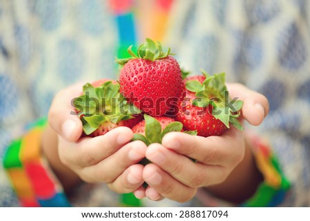 Strawberries in Hand