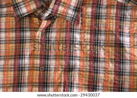 Textured background made of checked colorful shirt