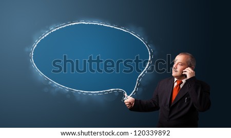 businessman in suit making phone call and presenting speech bubble copy space