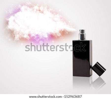 women\'s perfume in beautiful bottle spraying colorful cloud, copyspace in cloud